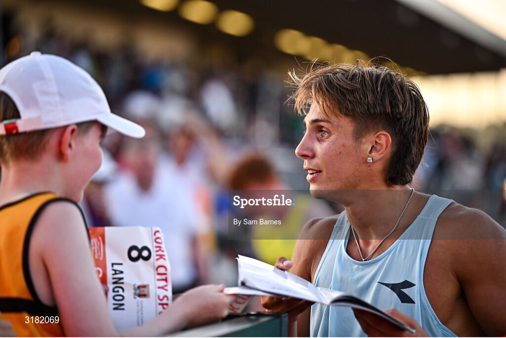 9 July 2025; Marco Langon of USA gives his race number to a supporter after winning the Cork City Council Men's Mile during the Cork City Sports meet at MTU Arena in Cork. Photo by Sam Barnes/Sportsfile