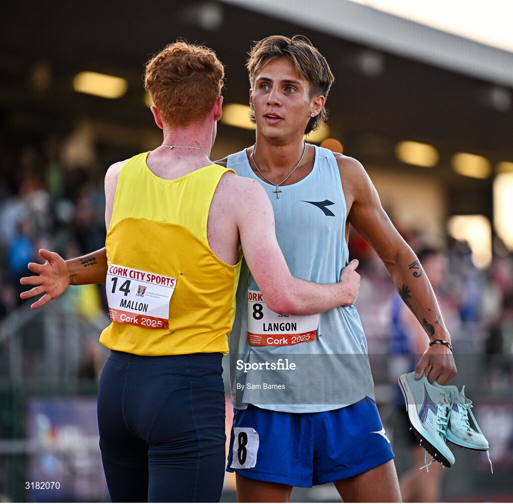 9 July 2025; Marco Langon of USA, right, hugs Lughaidh Mallon of Ireland after winning the Cork City Council Men's Mile during the Cork City Sports meet at MTU Arena in Cork. Photo by Sam Barnes/Sportsfile