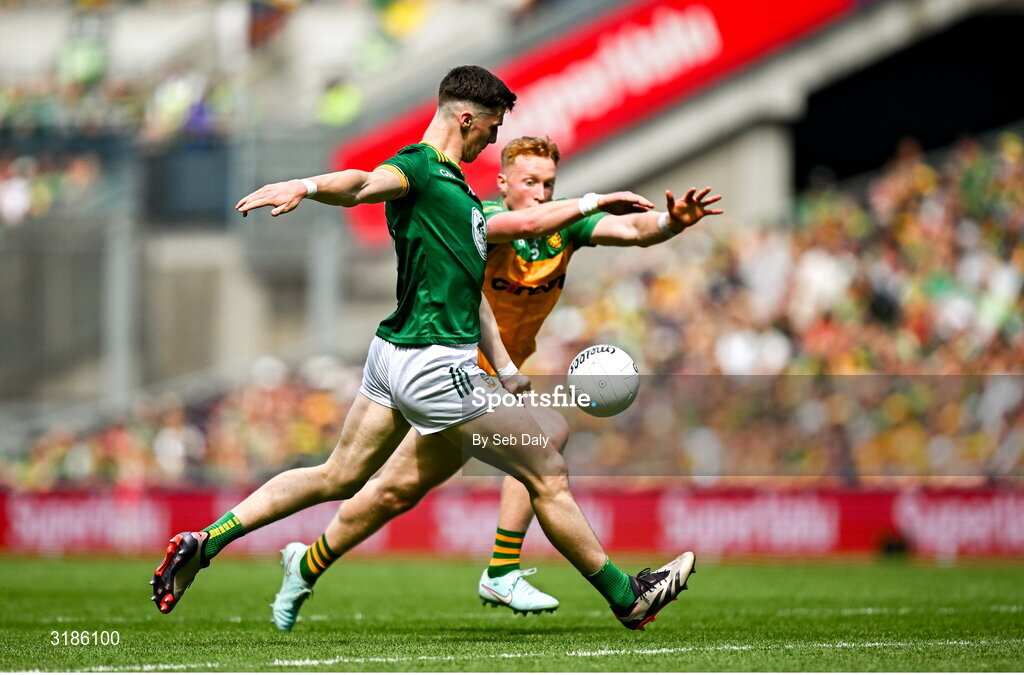 13 July 2025; Conor Duke of Meath in action against Oisin Gallen of Donegal during the GAA Football All-Ireland Senior Championship semi-final match between Meath and Donegal at Croke Park in Dublin. Photo by Seb Daly/Sportsfile