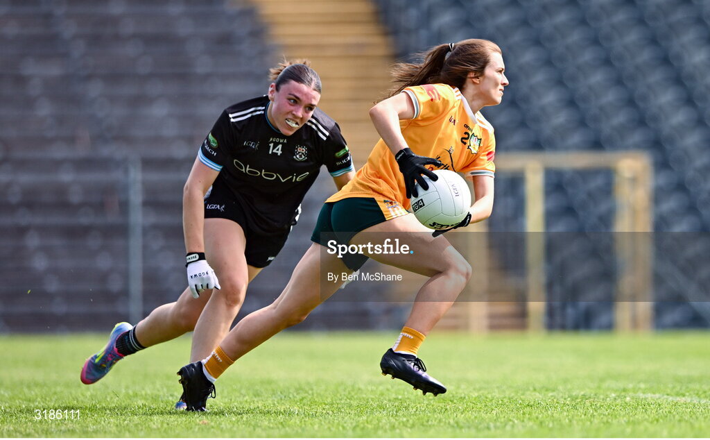 13 July 2025; Niamh McIntosh of Antrim in action against Cora Gilligan of Sligo during the TG4 All-Ireland Ladies Football Junior Championship semi-final match between Antrim and Sligo at St Tiernach’s Park in Clones, Monaghan. Photo by Ben McShane/Sportsfile