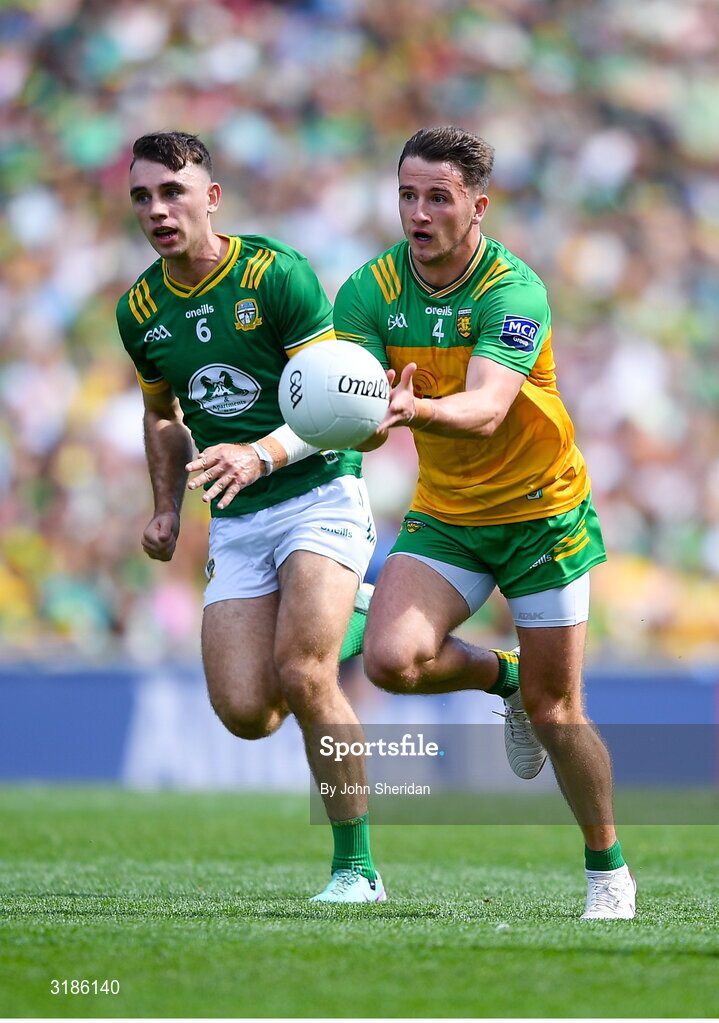 13 July 2025; Peadar Mogan of Donegal in action against Seán Coffey of Meath during the GAA Football All-Ireland Senior Championship semi-final match between Meath and Donegal at Croke Park in Dublin. Photo by John Sheridan/Sportsfile