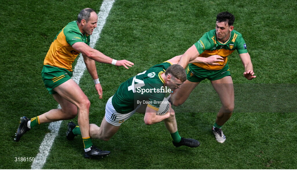 13 July 2025; Mathew Costello of Meath in action against Michael Murphy, left, and Michael Langan of Donegal during the GAA Football All-Ireland Senior Championship semi-final match between Meath and Donegal at Croke Park in Dublin. Photo by Daire Brennan/Sportsfile