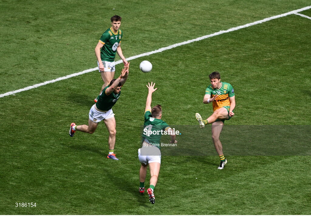 13 July 2025; Shane O'Donnell of Donegal in action against Eoghan Frayne, left, and Ronan Ryan of Meath during the GAA Football All-Ireland Senior Championship semi-final match between Meath and Donegal at Croke Park in Dublin. Photo by Daire Brennan/Sportsfile