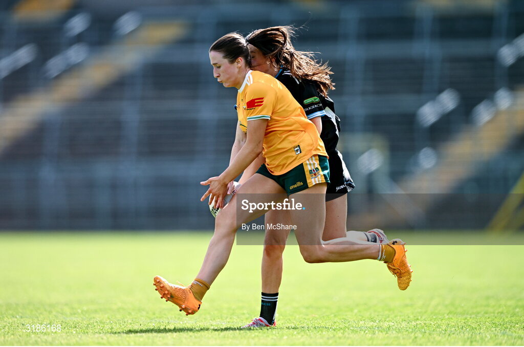 13 July 2025; Maria O'Neill of Antrim in action against Hannah Walsh of Sligo during the TG4 All-Ireland Ladies Football Junior Championship semi-final match between Antrim and Sligo at St Tiernach’s Park in Clones, Monaghan. Photo by Ben McShane/Sportsfile