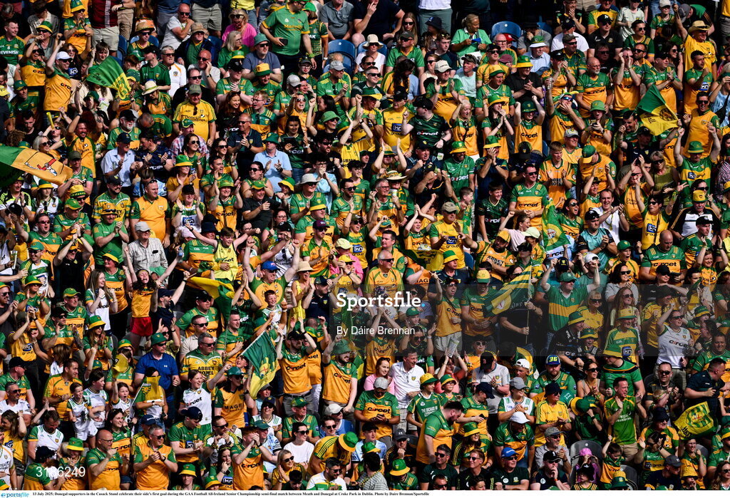 13 July 2025; Donegal supporters in the Cusack Stand celebrate their side's first goal during the GAA Football All-Ireland Senior Championship semi-final match between Meath and Donegal at Croke Park in Dublin. Photo by Daire Brennan/Sportsfile