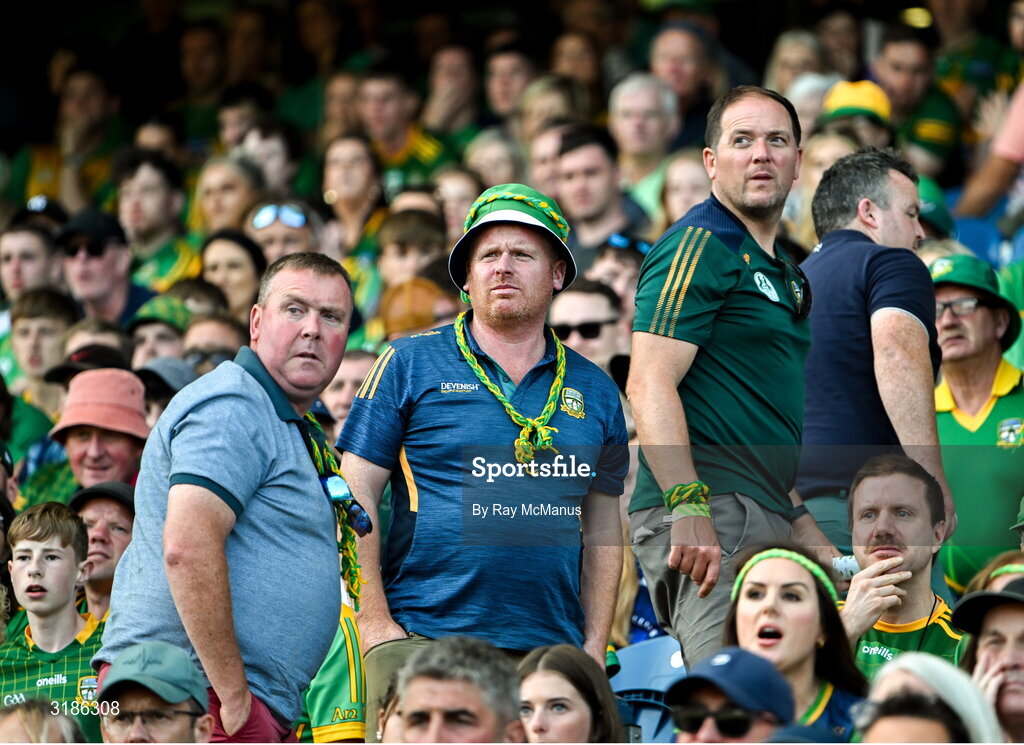 13 July 2025; Meath supporters take one last look as they head out of the Hogan Stand, in the 64th minute, of the GAA Football All-Ireland Senior Championship semi-final match between Meath and Donegal at Croke Park in Dublin. Photo by Ray McManus/Sportsfile