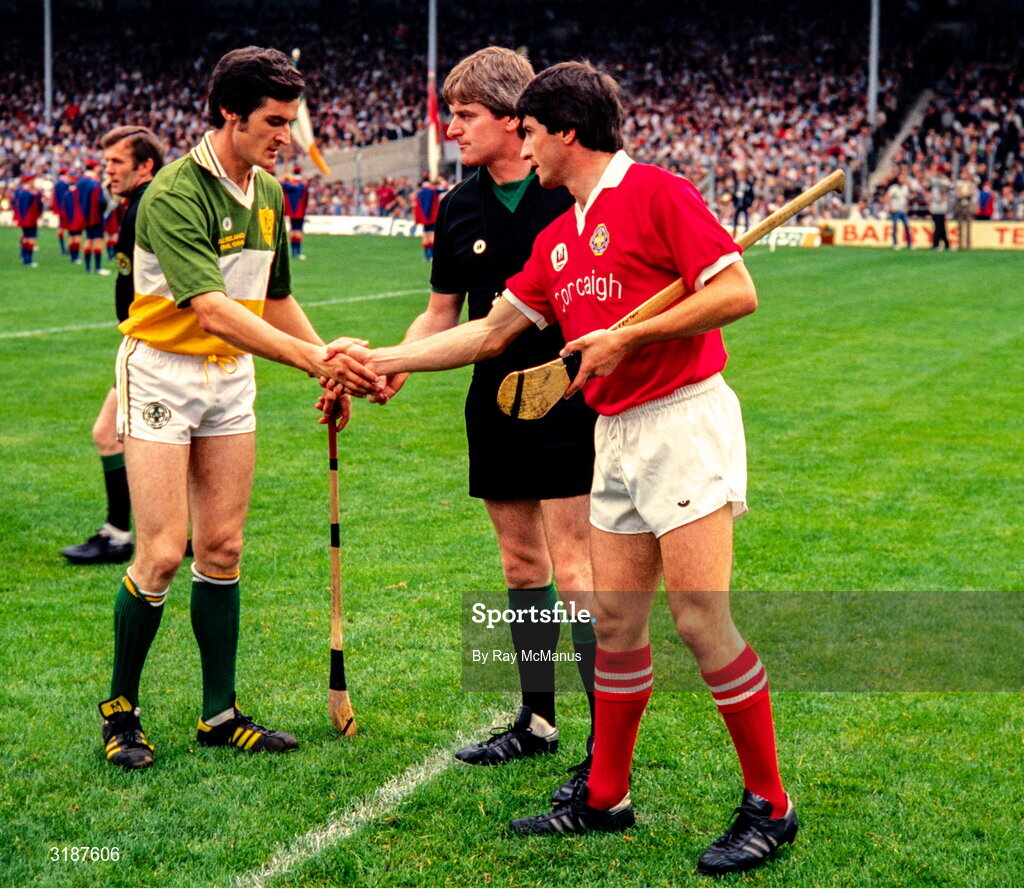 2 September 1984; Offaly captain Pat Fleury, left, and Cork captain John Fenton shake hands in the company of referee Paschal Long before the All-Ireland Senior Hurling Championship Final between Cork and Offaly at Semple Stadium in Thurles, Tipperary. Photo by Ray McManus/Sportsfile