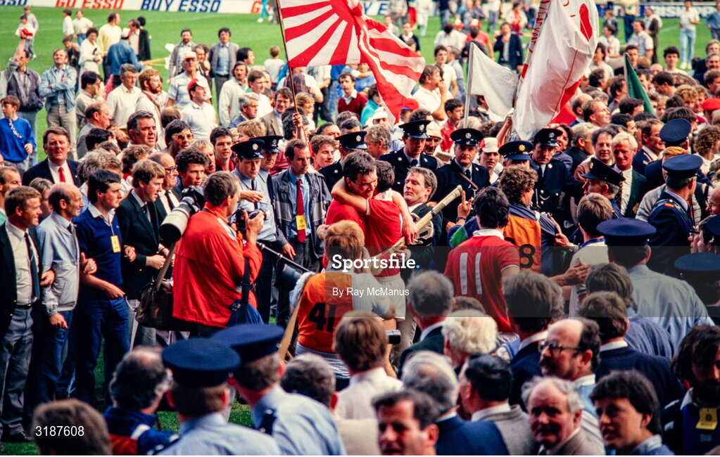 2 September 1984; Cork players embrace each other surrounded by fans and photographers after their side's victory in the All-Ireland Senior Hurling Championship Final between Cork and Offaly at Semple Stadium in Thurles, Tipperary. Photo by Ray McManus/Sportsfile