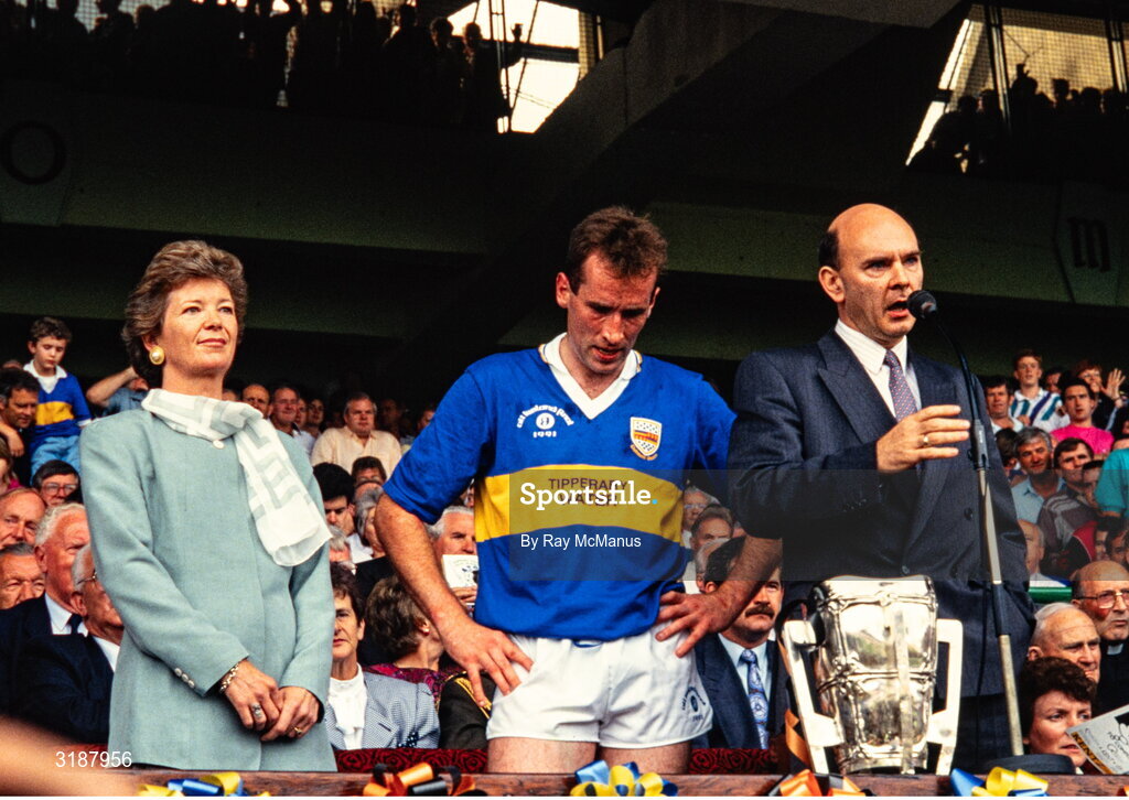 1 September 1991; GAA president peter Quinn, makes a speech, in the company of victorious Tipperary captain Declan Carr and President of Ireland Mary Robinson after the All-Ireland Senior Hurling Championship Final match between Tipperary and Kilkenny at Croke Park in Dublin. Photo by Ray McManus/Sportsfile