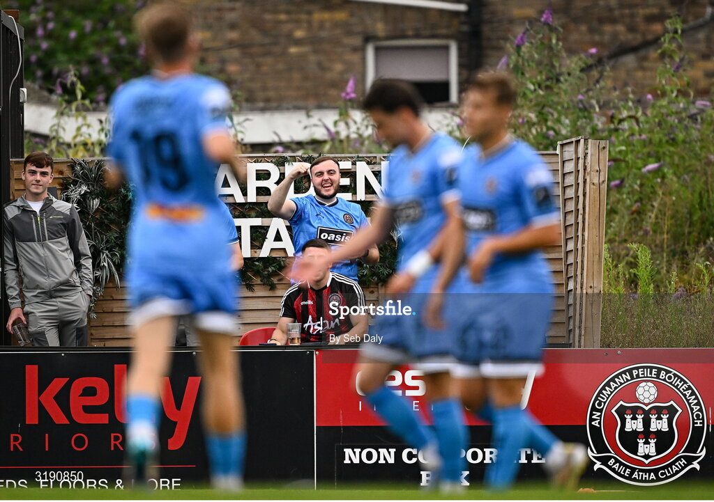 18 July 2025; A Bohemians supporter in the Garden Stand celebrates his side's third goal, scored by Markuss Strods, during the Sports Direct Men’s FAI Cup second round match between Killester Donnycarney and Bohemians at Dalymount Park in Dublin. Photo by Seb Daly/Sportsfile