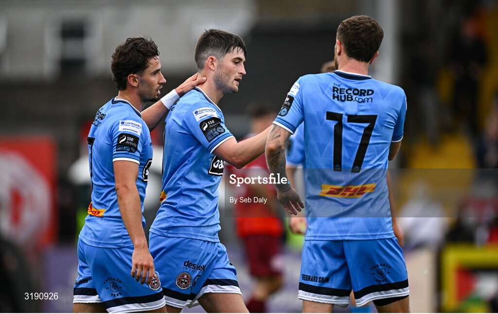 18 July 2025; Bohemians players, from left, Connor Parsons, Colm Whelan and Adam McDonnell celebrates their side's fourth goal during the Sports Direct Men’s FAI Cup second round match between Killester Donnycarney and Bohemians at Dalymount Park in Dublin. Photo by Seb Daly/Sportsfile