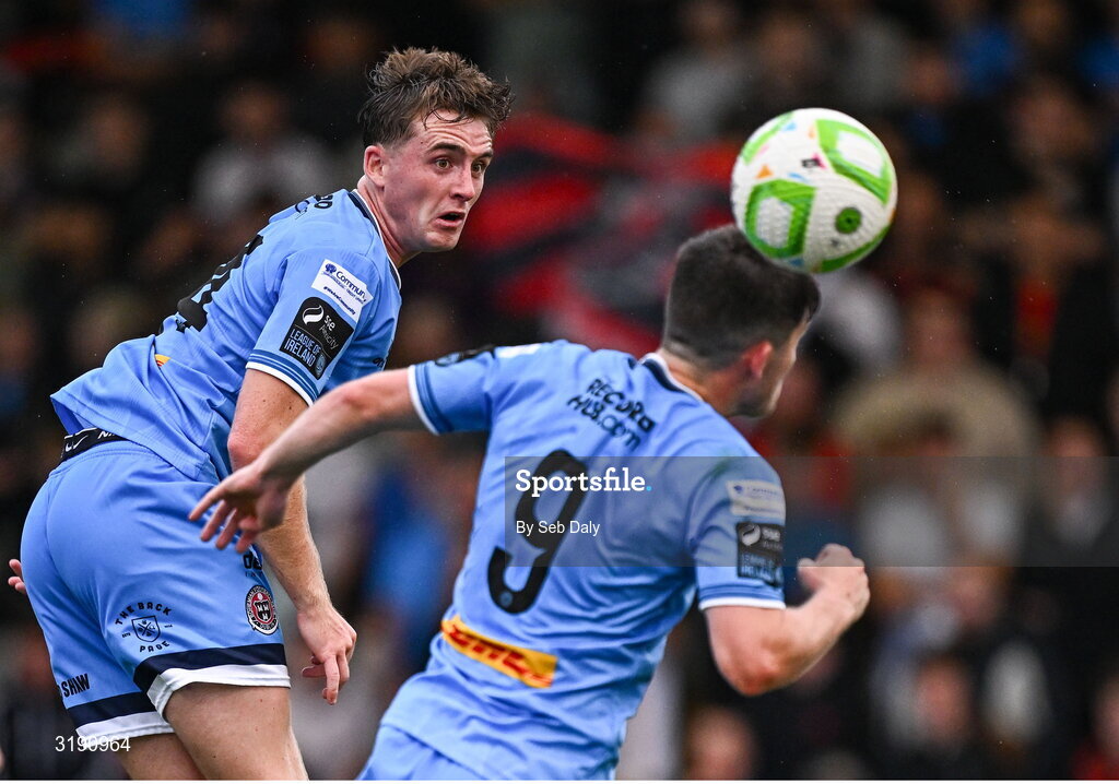 18 July 2025; Bohemians players Cian Byrne and Colm Whelan during the Sports Direct Men’s FAI Cup second round match between Killester Donnycarney and Bohemians at Dalymount Park in Dublin. Photo by Seb Daly/Sportsfile