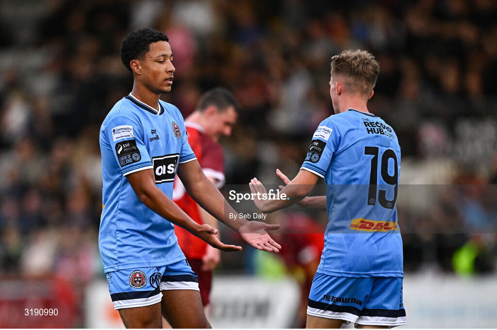 18 July 2025; Rhys Brennan of Bohemians, right, celebrates with teammate Declan Osagie after scoring their side's sixth goal during the Sports Direct Men’s FAI Cup second round match between Killester Donnycarney and Bohemians at Dalymount Park in Dublin. Photo by Seb Daly/Sportsfile
