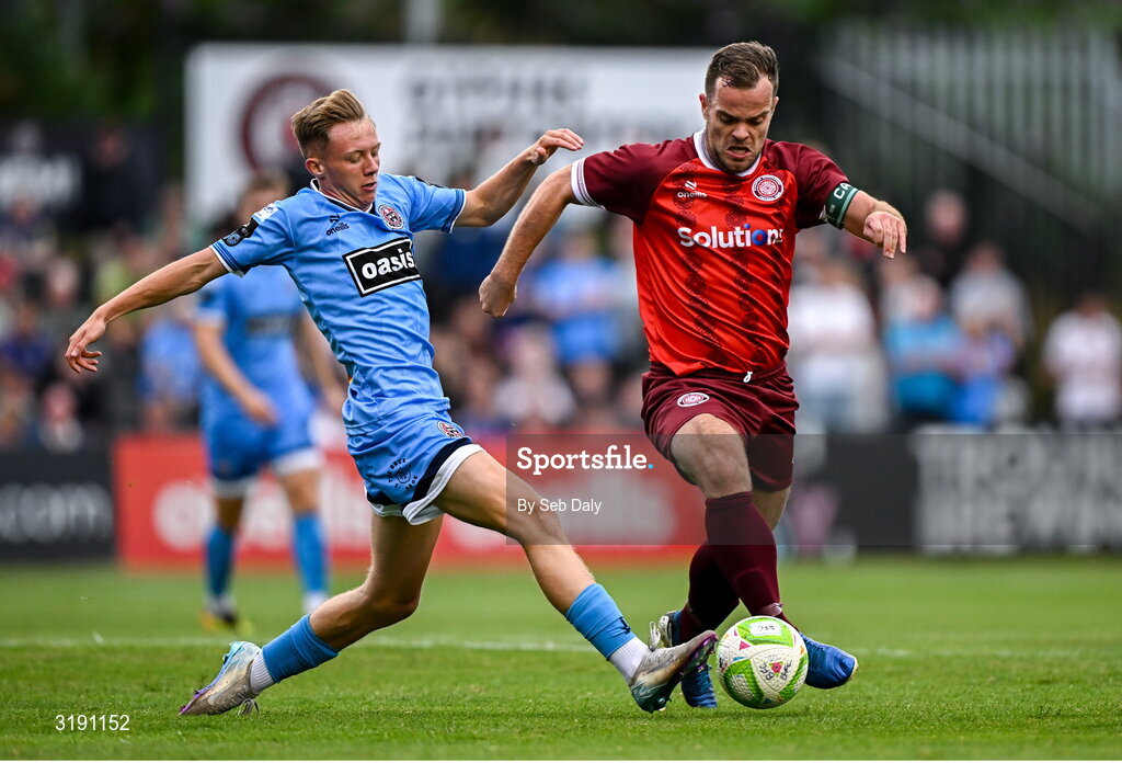 18 July 2025; Stephen Chambers of Killester Donnycarney in action against Rhys Brennan of Bohemians during the Sports Direct Men’s FAI Cup second round match between Killester Donnycarney and Bohemians at Dalymount Park in Dublin. Photo by Seb Daly/Sportsfile