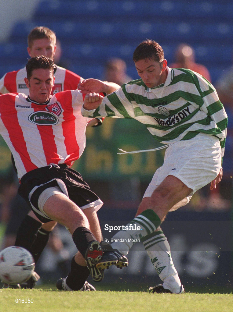 20 September 1998; Billy Woods of Shamrock Rovers gets his shot away under pressure from Gary Beckett of Derry City during the Harp Lager National League Premier Division match between Shamrock Rovers and Derry City at Tolka Park in Dublin. Photo by Brendan Moran/Sportsfile