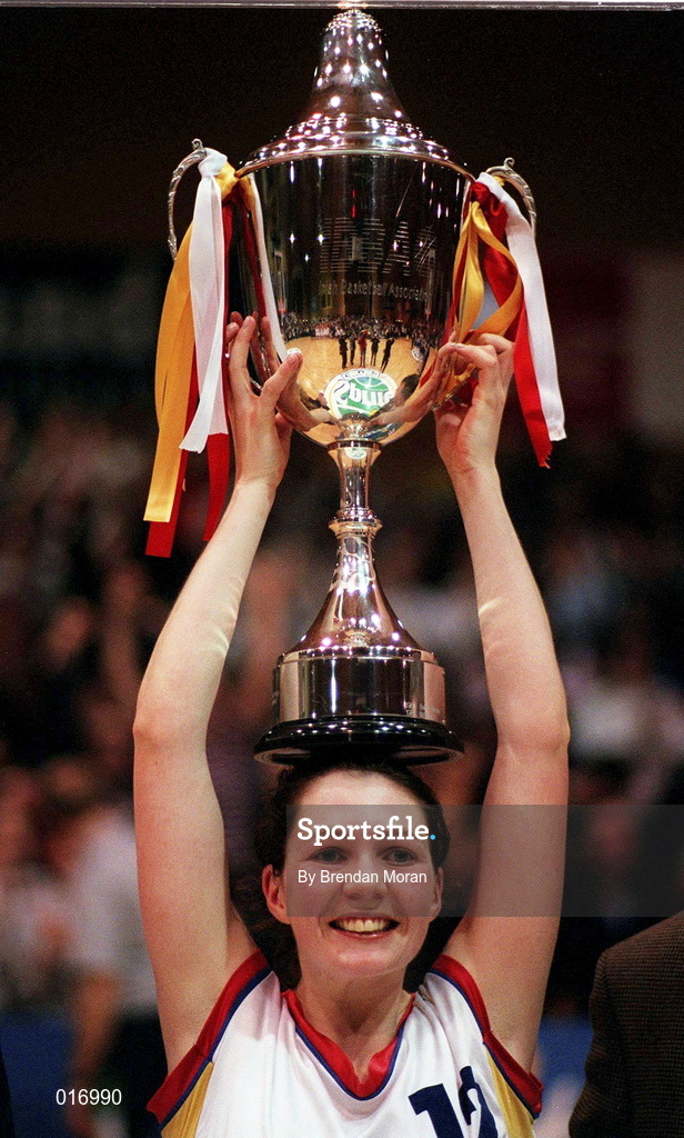 25 January 1998; Wildcats captain Christine Kiely lifts the cup following the Sprite Women's Senior National Cup Final between Snowcream Waterford Wildcats and Opennet Naomh Mhuire at the National Basketball Arena in Tallaght, Dublin. Photo by Brendan Moran/Sportsfile