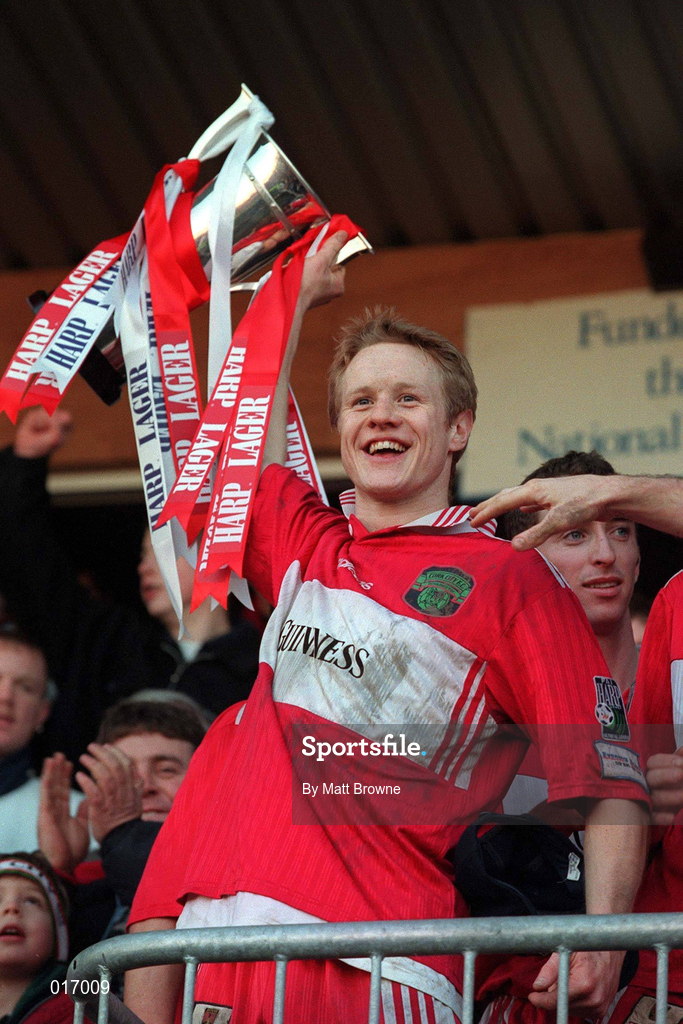 30 December 1998; Colin O'Brien of Cork City lifts the cup following the Harp Lager League Cup Final 2nd Leg match between Cork City and Shamrock Rovers at Turner's Cross in Cork. Photo by Matt Browne/Sportsfile.