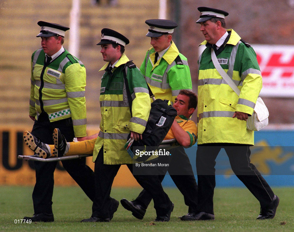 18 July 1998; Victor Segura of Norwich City is stretchered off the pitch after picking up an injury during the Club Friendly match between St Patrick's Athletic and Norwich City at Richmond Park in Dublin. Photo By Brendan Moran/Sportsfile.