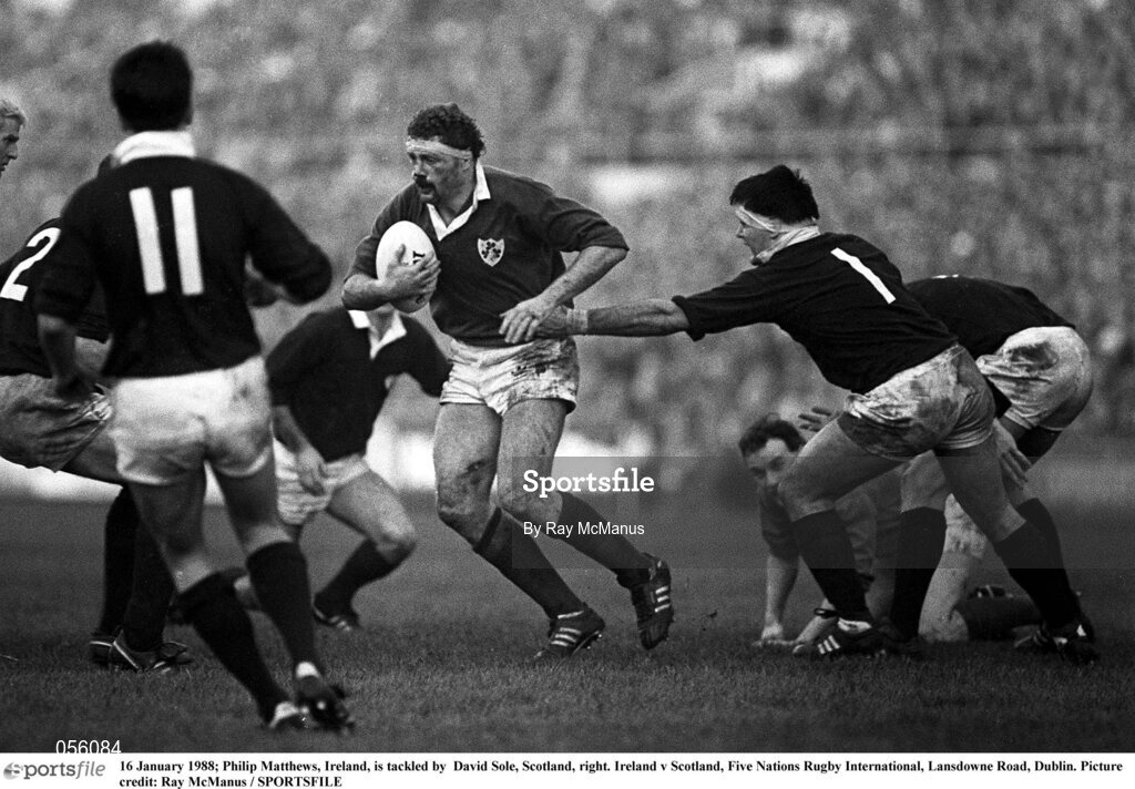 16 January 1988; Philip Matthews, Ireland, is tackled by David Sole, Scotland, right. Ireland v Scotland, Five Nations Rugby International, Lansdowne Road, Dublin. Picture credit: Ray McManus / SPORTSFILE