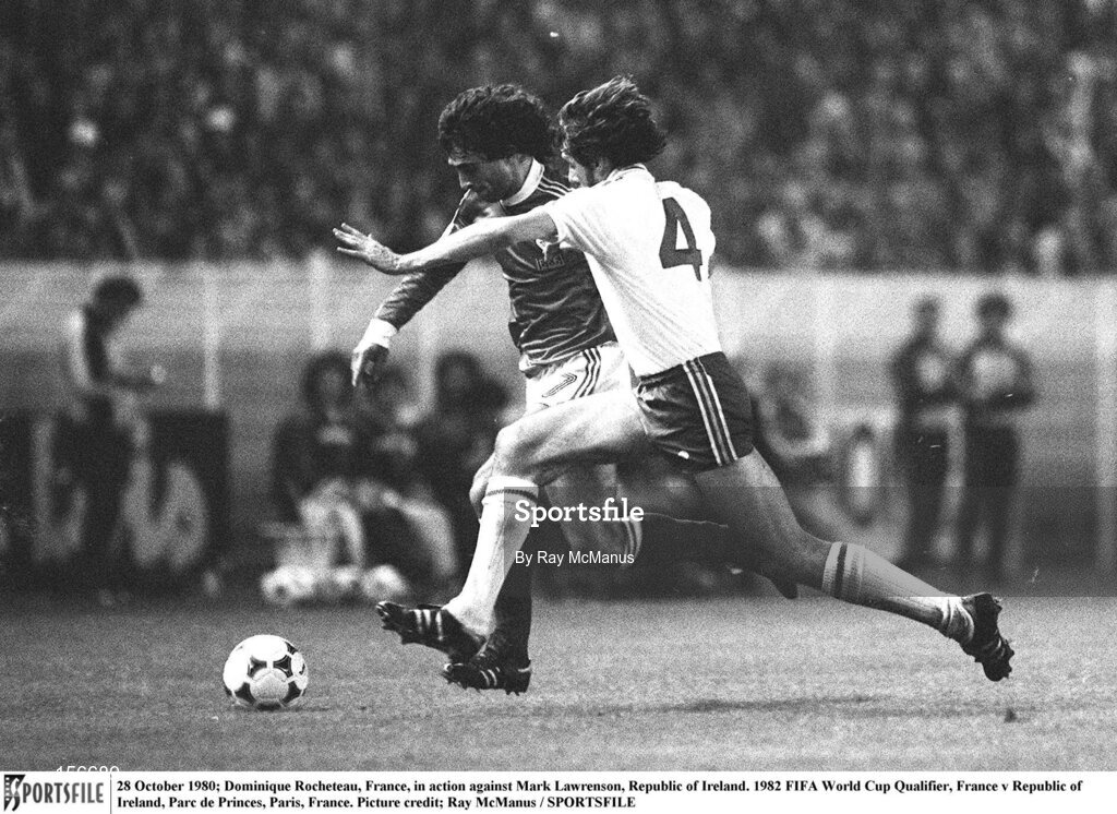 28 October 1980; Dominique Rocheteau, France, in action against Mark Lawrenson, Republic of Ireland. 1982 FIFA World Cup Qualifier, France v Republic of Ireland, Parc de Princes, Paris, France. Picture credit; Ray McManus / SPORTSFILE