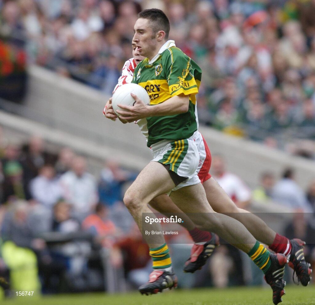 26 September 2004; Brian Moran, Kerry, in action against Niall Kerr, Tyrone. All-Ireland Minor Football Championship Final, Kerry v Tyrone, Croke Park, Dublin. Picture credit; Brian Lawless / SPORTSFILE *** Local Caption *** Any photograph taken by SPORTSFILE during, or in connection with, the 2004 All-Ireland Minor Football Final which displays GAA logos or contains an image or part of an image of any GAA intellectual property, or, which contains images of a GAA player/players in their playing uniforms, may only be used for editorial and non-advertising purposes.  Use of photographs for advertising, as posters or for purchase separately is strictly prohibited unless prior written approval has been obtained from the Gaelic Athletic Association.