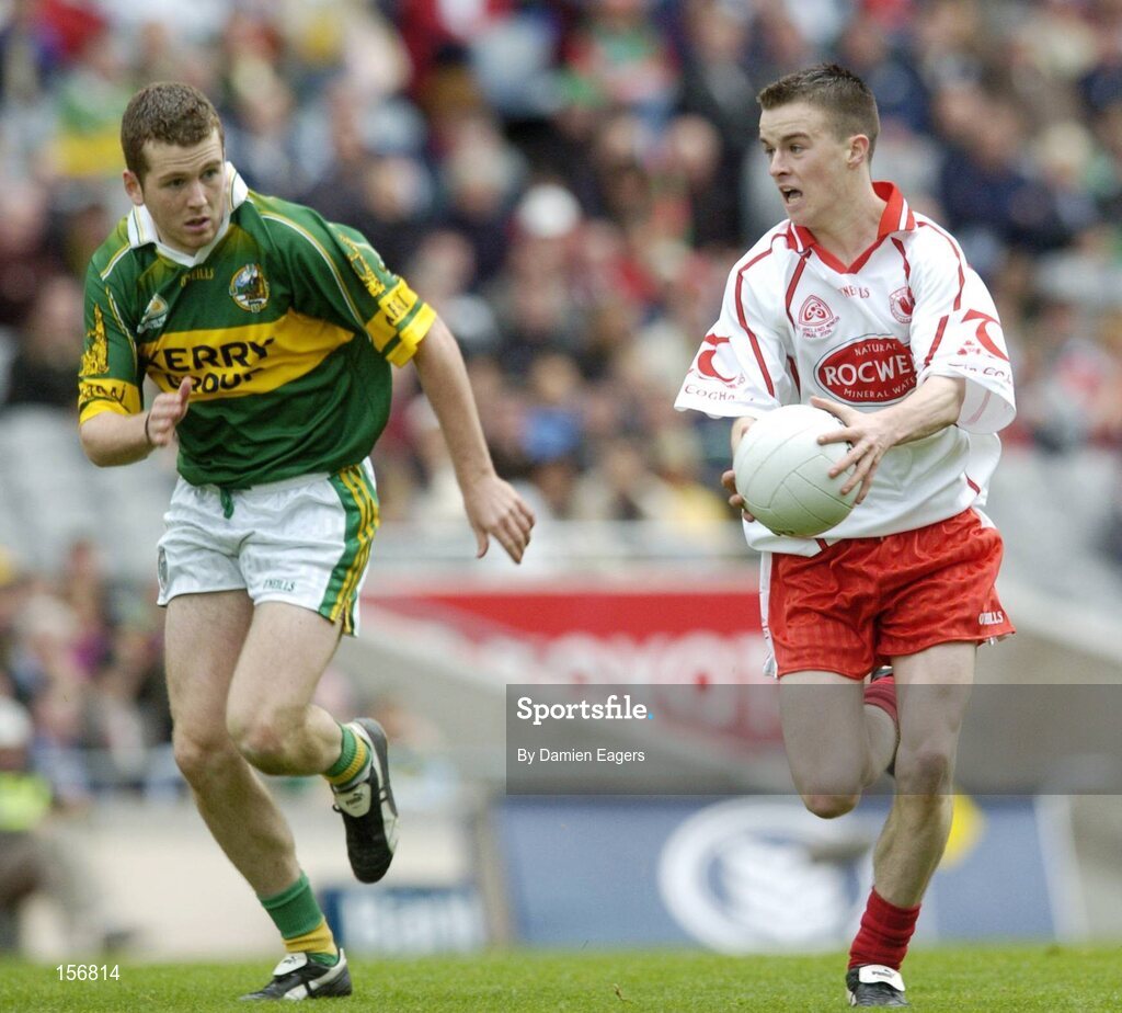 26 September 2004; Ronan McRory, Tyrone, in action against Kerry. All-Ireland Minor Football Championship Final, Kerry v Tyrone, Croke Park, Dublin. Picture credit; Damien Eagers / SPORTSFILE *** Local Caption *** Any photograph taken by SPORTSFILE during, or in connection with, the 2004 All-Ireland Minor  Football Final which displays GAA logos or contains an image or part of an image of any GAA intellectual property, or, which contains images of a GAA player/players in their playing uniforms, may only be used for editorial and non-advertising purposes.  Use of photographs for advertising, as posters or for purchase separately is strictly prohibited unless prior written approval has been obtained from the Gaelic Athletic Association.