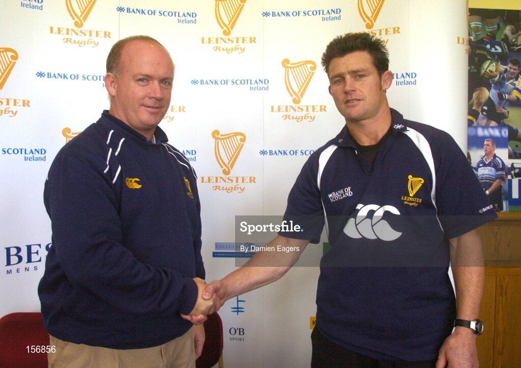 30 September 2004; David Holwell, left, shakes hands with Leinster coach Declan Kidney after a press conference announcing his signing for Leinster. Old Belvedere, Dublin. Picture credit; Damien Eagers / SPORTSFILE