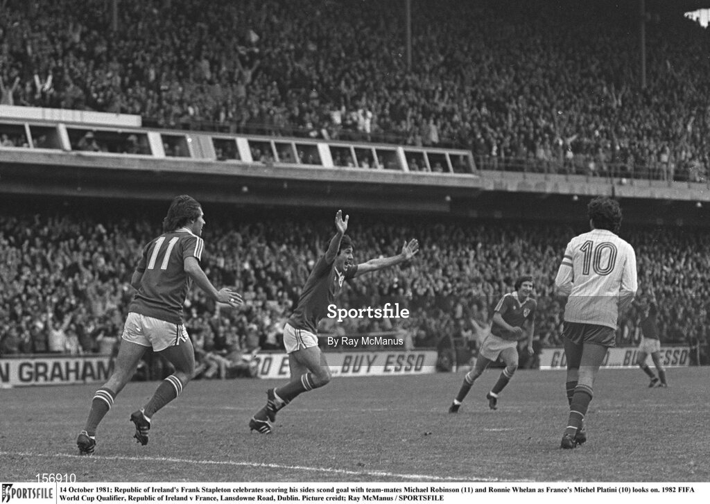 14 October 1981; Republic of Ireland's Frank Stapleton celebrates scoring his sides scond goal with team-mates Michael Robinson, 11, and Ronnie Whelan as France's Michel Platini, 10, looks on. 1982 FIFA World Cup Qualifier, Republic of Ireland v France, Lansdowne Road, Dublin. Picture credit: Ray McManus / SPORTSFILE