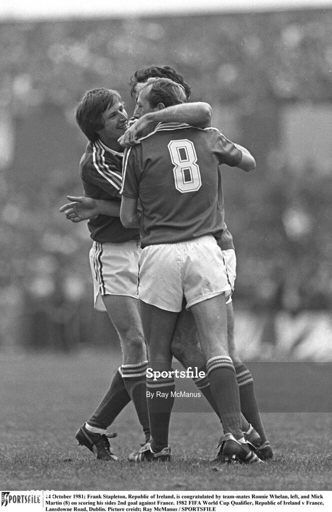 14 October 1981; Frank Stapleton, Republic of Ireland, is congratulated by team-mates Ronnie Whelan, left, and Mick Martin, 8, on scoring his sides 2nd goal against France. 1982 FIFA World Cup Qualifier, Republic of Ireland v France, Lansdowne Road, Dublin. Picture credit: Ray McManus / SPORTSFILE