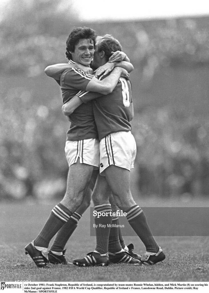 14 October 1981; Frank Stapleton, Republic of Ireland, is congratulated by team-mates Ronnie Whelan, hidden, and Mick Martin (8) on scoring his sides 2nd goal against France. 1982 FIFA World Cup Qualifier, Republic of Ireland v France, Lansdowne Road, Dublin. Picture credit; Ray McManus / SPORTSFILE