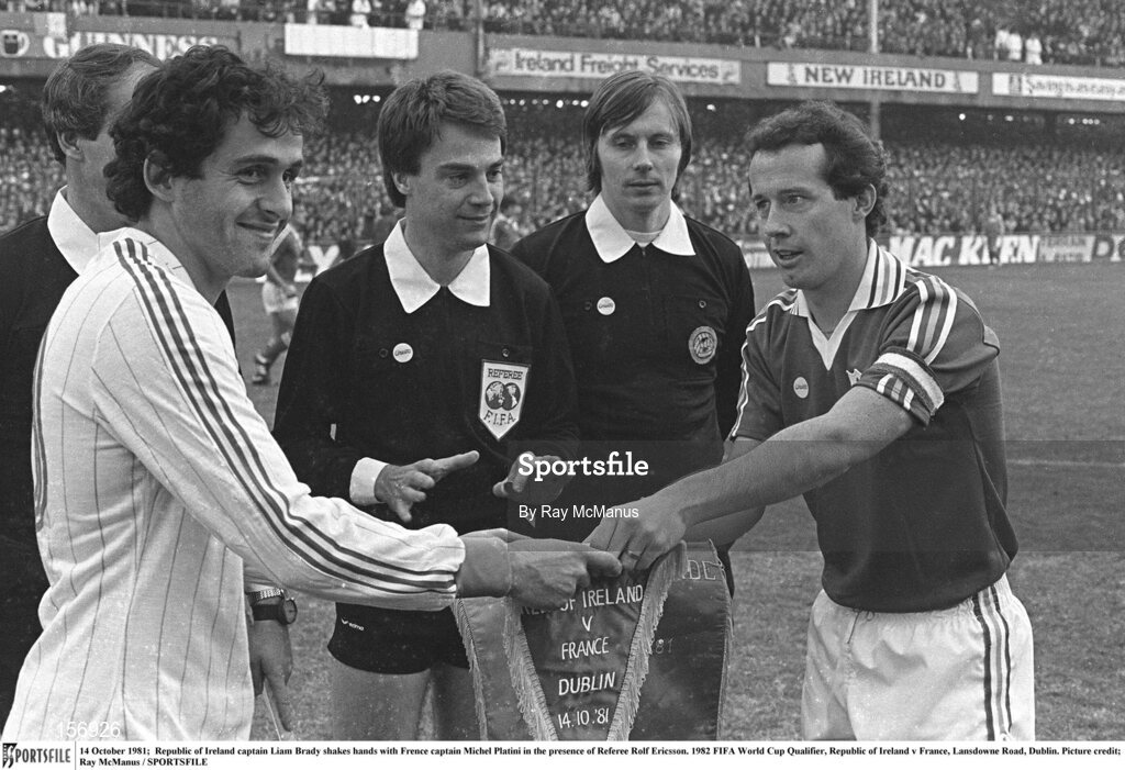 14 October 1981; Republic of Ireland captain Liam Brady, right, shakes hands with France captain Michel Platini in the presence of Referee Rolf Ericsson. 1982 FIFA World Cup Qualifier, Republic of Ireland v France, Lansdowne Road, Dublin. Picture credit: Ray McManus / SPORTSFILE
