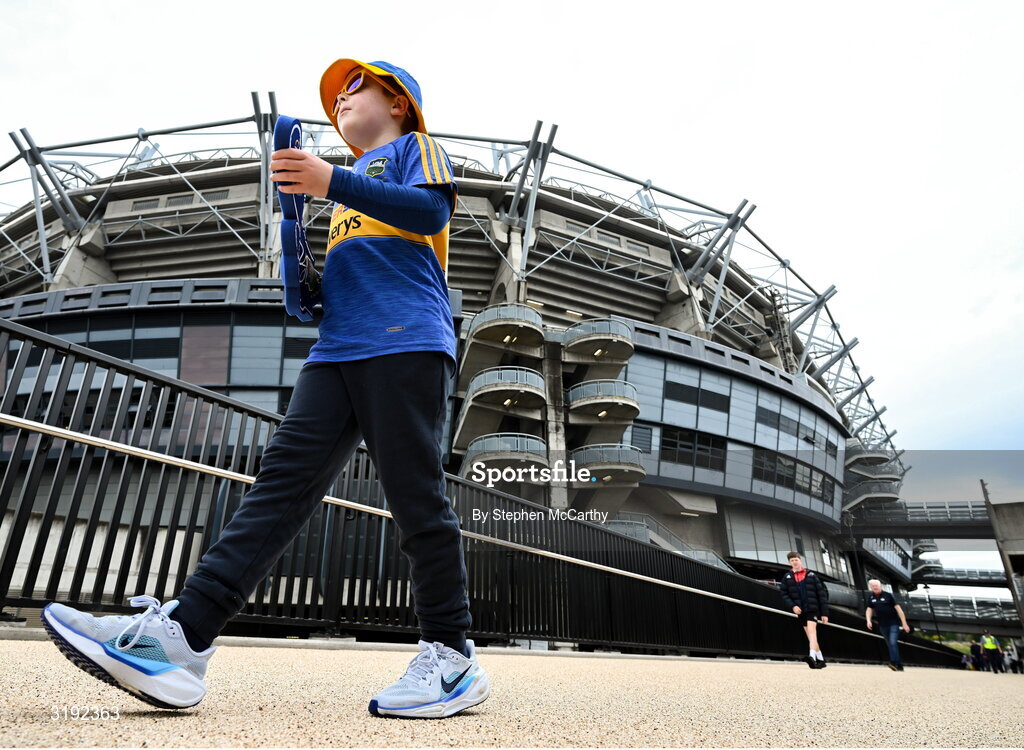 20 July 2025; A Tipperary supporter walks by Croke Park before the GAA Hurling All-Ireland Senior Championship final match between Cork and Tipperary at Croke Park in Dublin. Photo by Stephen McCarthy/Sportsfile