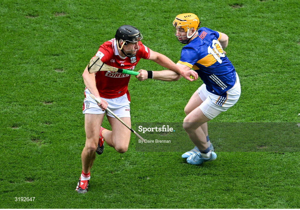 20 July 2025; Robert Downey of Cork in action against Jake Morris of Tipperary during the GAA Hurling All-Ireland Senior Championship final match between Cork and Tipperary at Croke Park in Dublin. Photo by Daire Brennan/Sportsfile