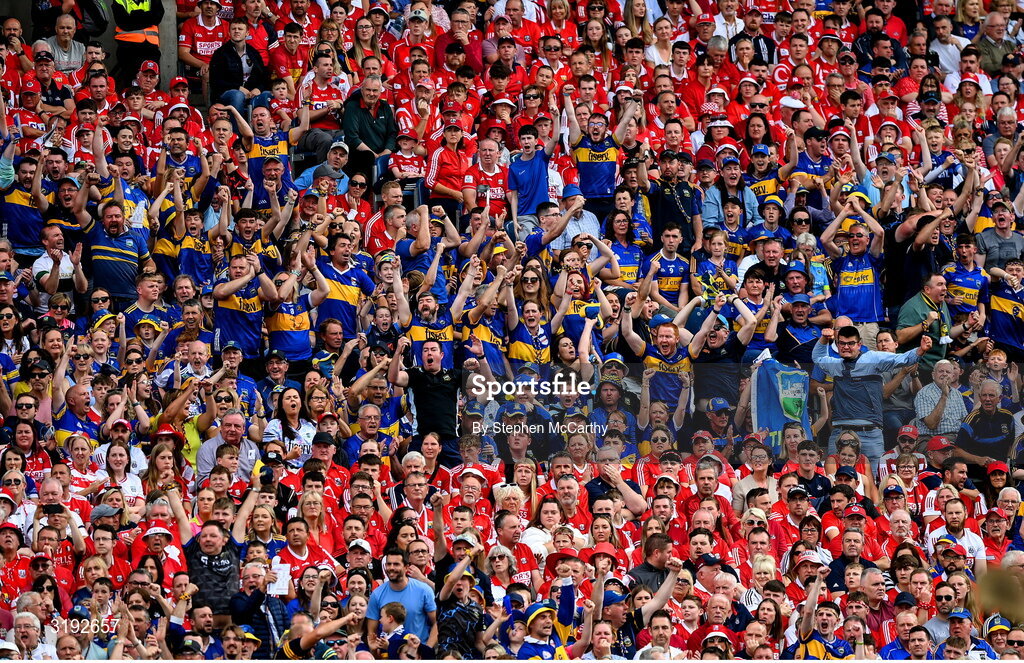 20 July 2025; Tipperary supporters celebrates a score during the GAA Hurling All-Ireland Senior Championship final match between Cork and Tipperary at Croke Park in Dublin. Photo by Stephen McCarthy/Sportsfile