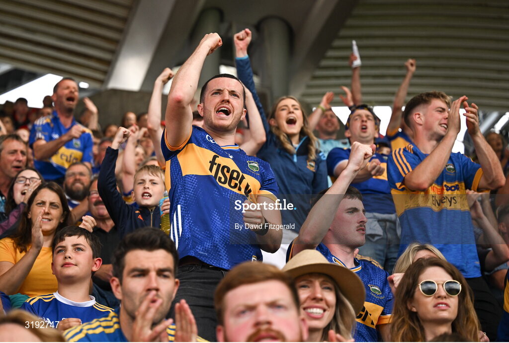 20 July 2025; Tipperary supporters celebrate a point during the GAA Hurling All-Ireland Senior Championship final match between Cork and Tipperary at Croke Park in Dublin. Photo by David Fitzgerald/Sportsfile