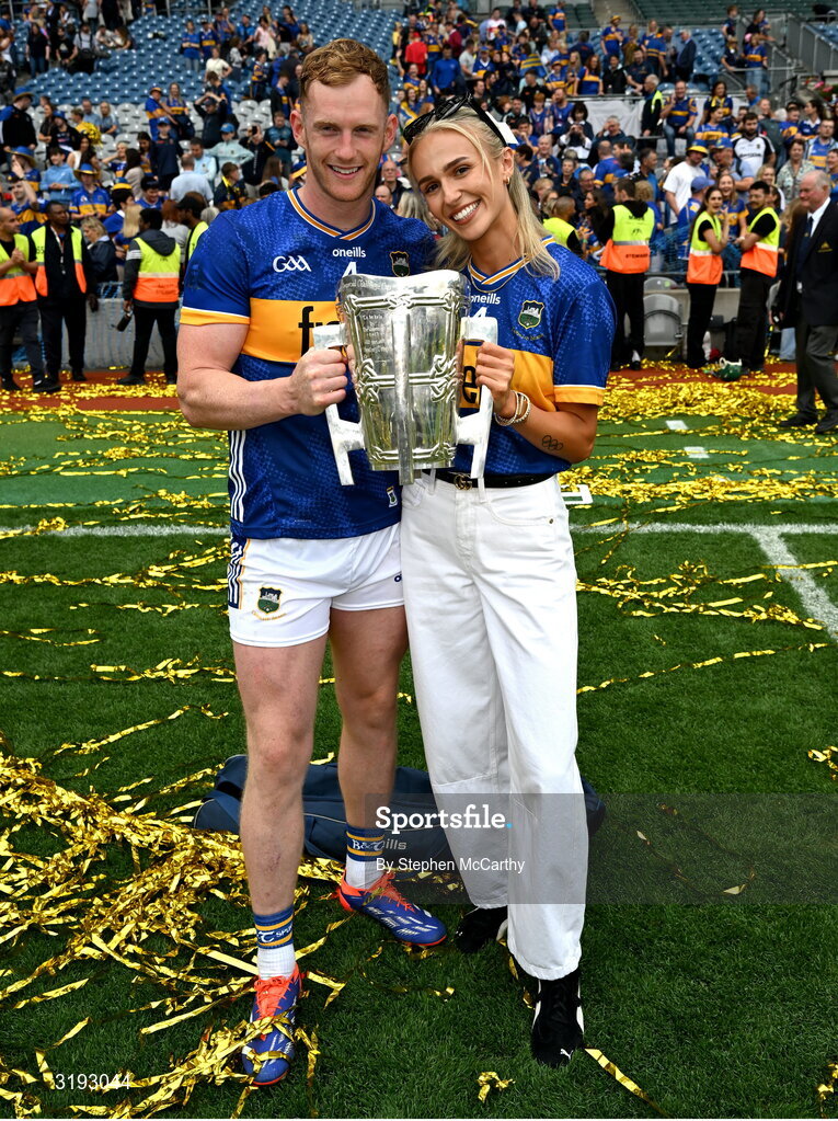 20 July 2025; Michael Breen of Tipperary and with his girlfriend, Irish Olympian, Sharlene Mawdsley celebrate with the Liam MacCarthy Cup after his side's victory in the GAA Hurling All-Ireland Senior Championship final match between Cork and Tipperary at Croke Park in Dublin. Photo by Stephen McCarthy/Sportsfile