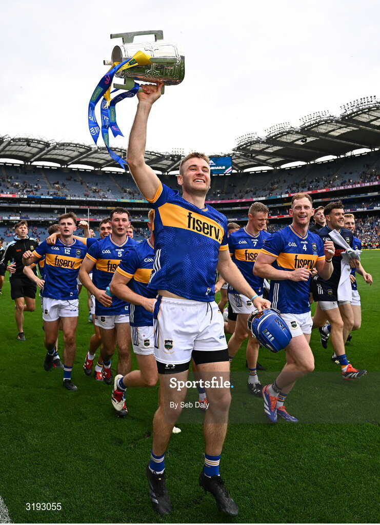 20 July 2025; John McGrath of Tipperary celebrates with the Liam MacCarthy cup after his side's victory in the GAA Hurling All-Ireland Senior Championship final match between Cork and Tipperary at Croke Park in Dublin. Photo by Seb Daly/Sportsfile