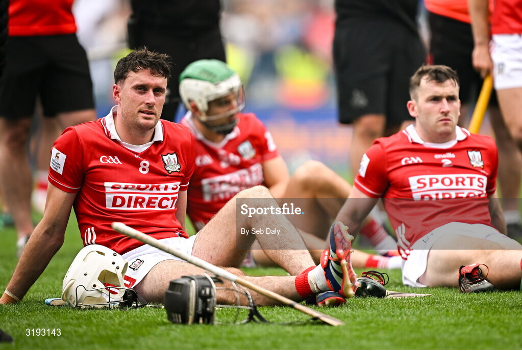 20 July 2025; Tim O'Mahony of Cork, left, and teammates after their side's defeat in the GAA Hurling All-Ireland Senior Championship final match between Cork and Tipperary at Croke Park in Dublin. Photo by Seb Daly/Sportsfile