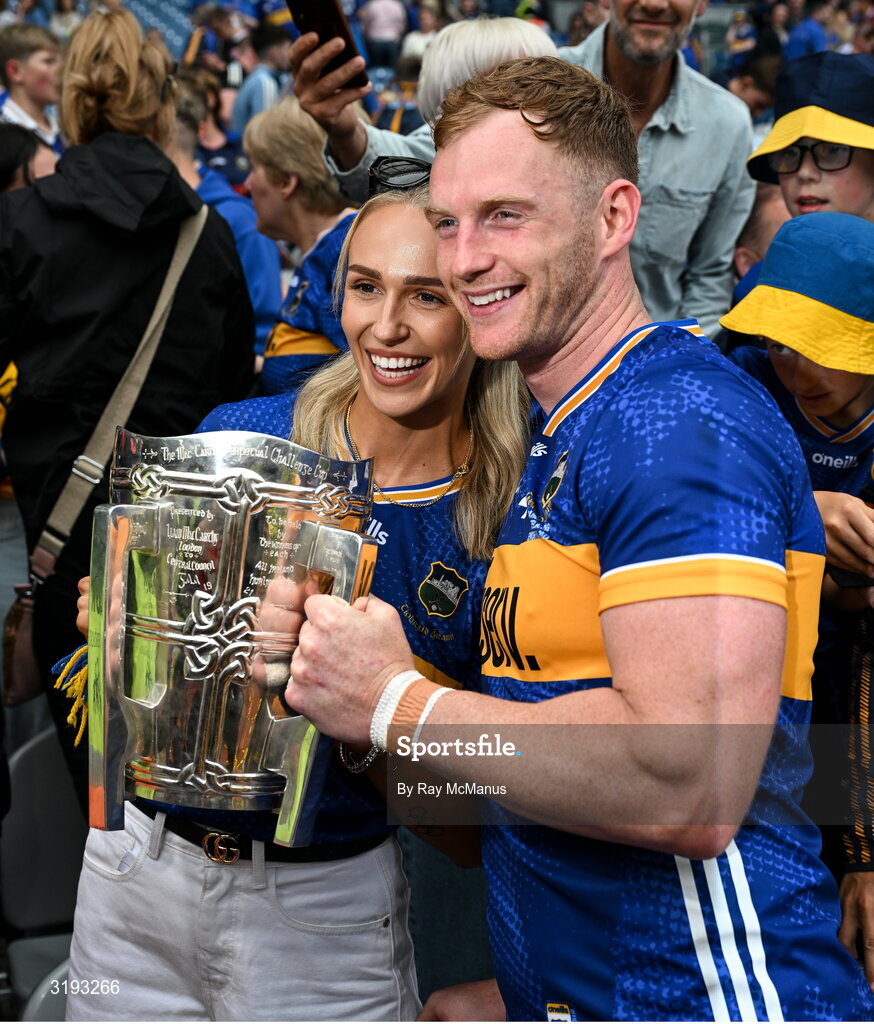 20 July 2025; Michael Breen of Tipperary celebrates with his girlfriend, Irish Olympian, Sharlene Mawdsley and the Liam MacCarthy Cup after his side's victory in the GAA Hurling All-Ireland Senior Championship final match between Cork and Tipperary at Croke Park in Dublin. Photo by Ray McManus/Sportsfile