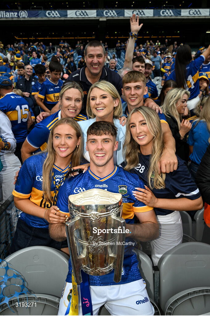 20 July 2025; Johnny Ryan of Tipperary and family celebrate with the Liam MacCarthy cup after their side's victory in the GAA Hurling All-Ireland Senior Championship final match between Cork and Tipperary at Croke Park in Dublin. Photo by Stephen McCarthy/Sportsfile
