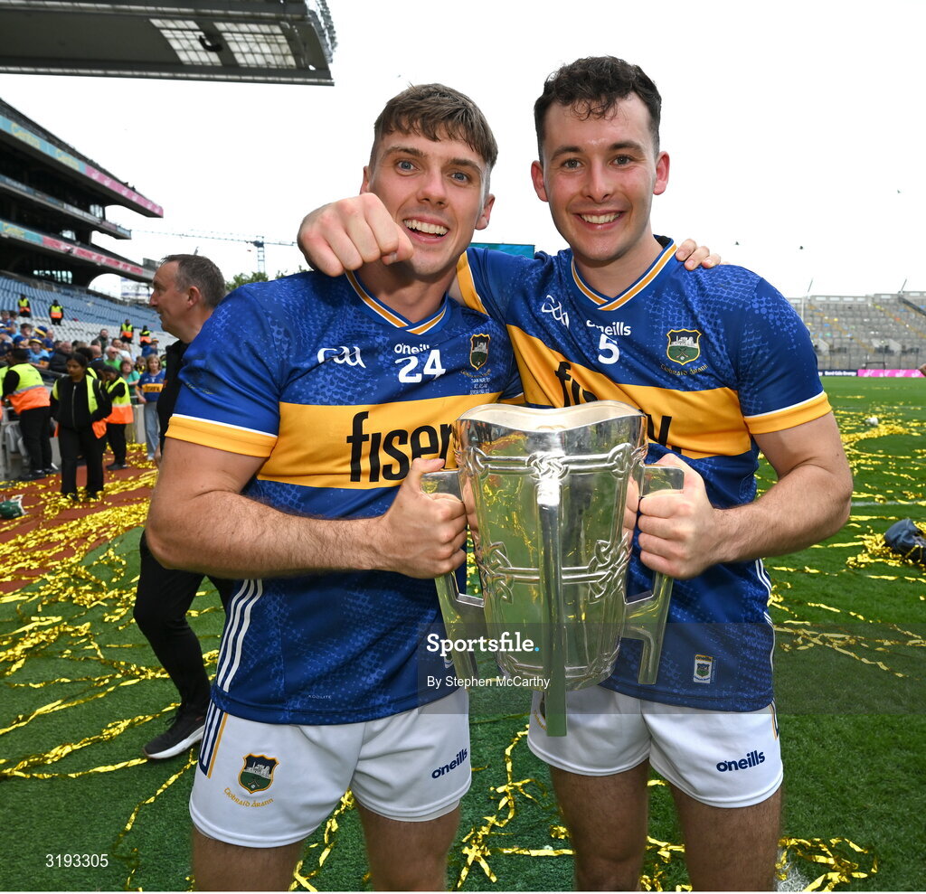 20 July 2025; Johnny Ryan, left, and Craig Morgan of Tipperary celebrate with the Liam MacCarthy cup after their side's victory in the GAA Hurling All-Ireland Senior Championship final match between Cork and Tipperary at Croke Park in Dublin. Photo by Stephen McCarthy/Sportsfile