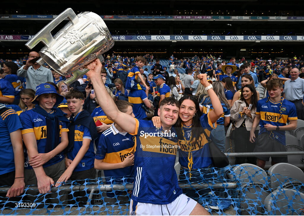 20 July 2025; Conor Stakelum of Tipperary celebrates with his partner Lauren McCormack and the Liam MacCarthy cup after the GAA Hurling All-Ireland Senior Championship final match between Cork and Tipperary at Croke Park in Dublin. Photo by Stephen McCarthy/Sportsfile