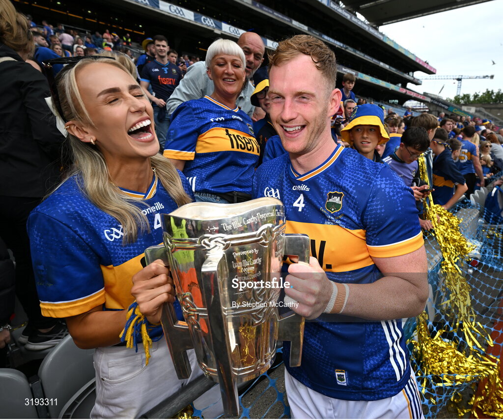20 July 2025; Michael Breen of Tipperary and his partner Irish Olympian Sharlene Mawdsley celebrate with the Liam MacCarthy cup after their side's victory in the GAA Hurling All-Ireland Senior Championship final match between Cork and Tipperary at Croke Park in Dublin. Photo by Stephen McCarthy/Sportsfile