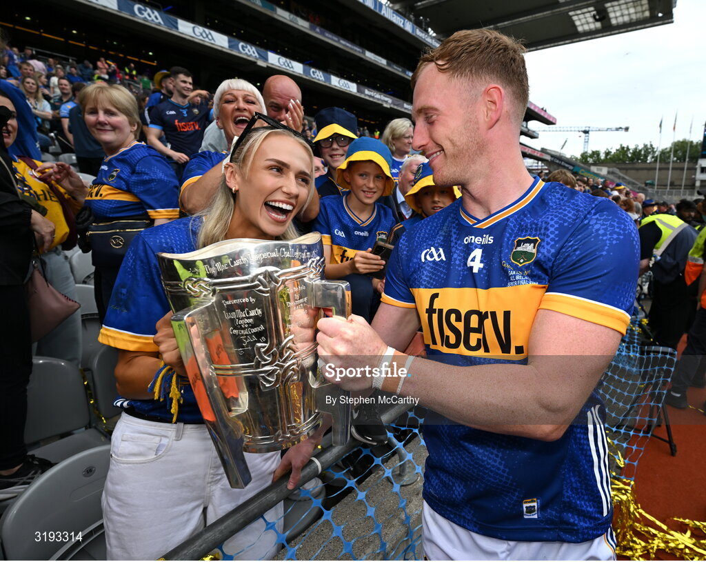 20 July 2025; Michael Breen of Tipperary and his partner Irish Olympian Sharlene Mawdsley celebrate with the Liam MacCarthy cup after their side's victory in the GAA Hurling All-Ireland Senior Championship final match between Cork and Tipperary at Croke Park in Dublin. Photo by Stephen McCarthy/Sportsfile