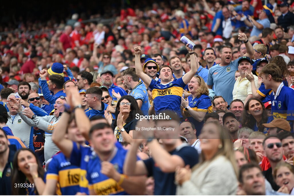 20 July 2025; Tipperary supporters celebrate during the GAA Hurling All-Ireland Senior Championship final match between Cork and Tipperary at Croke Park in Dublin. Photo by Stephen McCarthy/Sportsfile