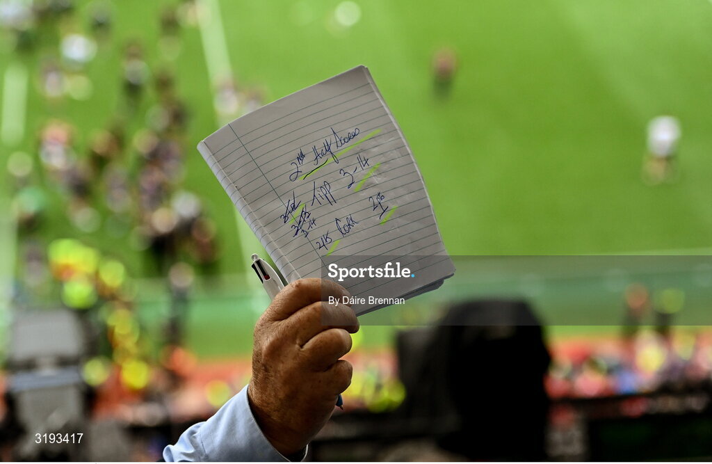20 July 2025; Dave Punch of RTÉ holds up his notes after the GAA Hurling All-Ireland Senior Championship final match between Cork and Tipperary at Croke Park in Dublin. Photo by Daire Brennan/Sportsfile