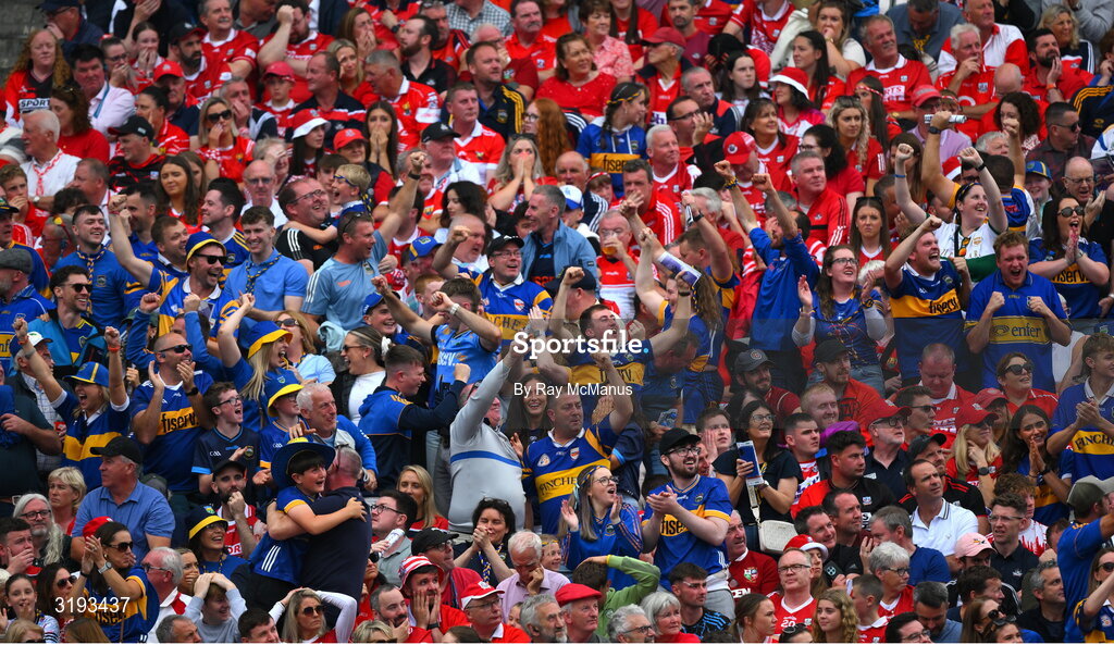 20 July 2025; Tipperary supporters celebrate a score during the GAA Hurling All-Ireland Senior Championship final match between Cork and Tipperary at Croke Park in Dublin. Photo by Ray McManus/Sportsfile