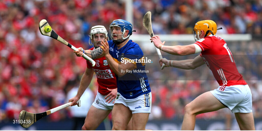 20 July 2025; Willie Connors of Tipperary is tackled by Shane Barrett and Brian Hayes of Cork during the GAA Hurling All-Ireland Senior Championship final match between Cork and Tipperary at Croke Park in Dublin. Photo by Ray McManus/Sportsfile