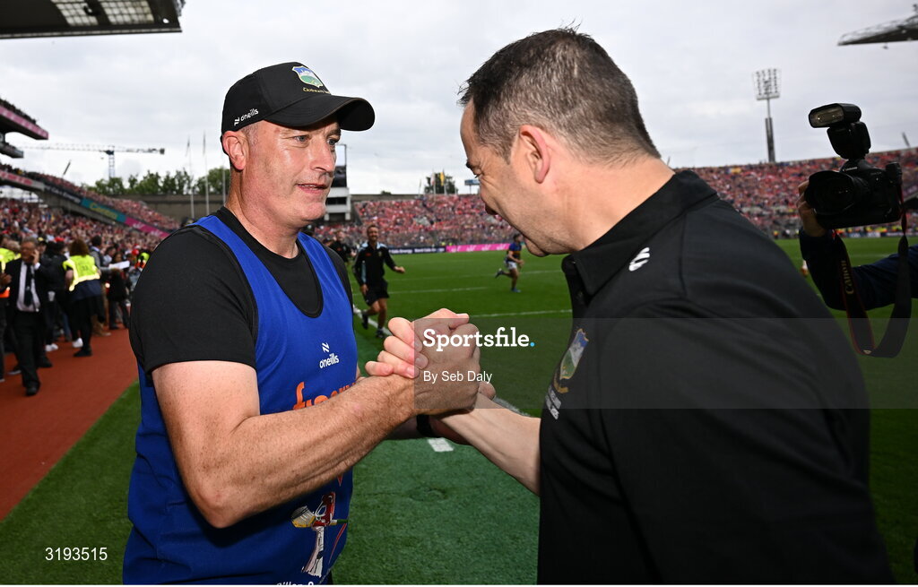 20 July 2025; Tipperary manager Liam Cahill, left, and selector Michael Bevans celebrate after their side's victory in the GAA Hurling All-Ireland Senior Championship final match between Cork and Tipperary at Croke Park in Dublin. Photo by Seb Daly/Sportsfile