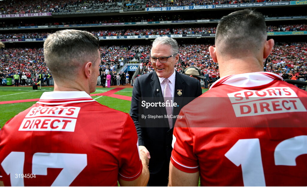 20 July 2025; Uachtarán Chumann Lúthchleas Gael Jarlath Burns meets Patrick Horgan of Cork before the GAA Hurling All-Ireland Senior Championship final match between Cork and Tipperary at Croke Park in Dublin. Photo by Stephen McCarthy/Sportsfile